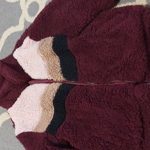 Burgundy cropped jacket. Size Medium with pockets